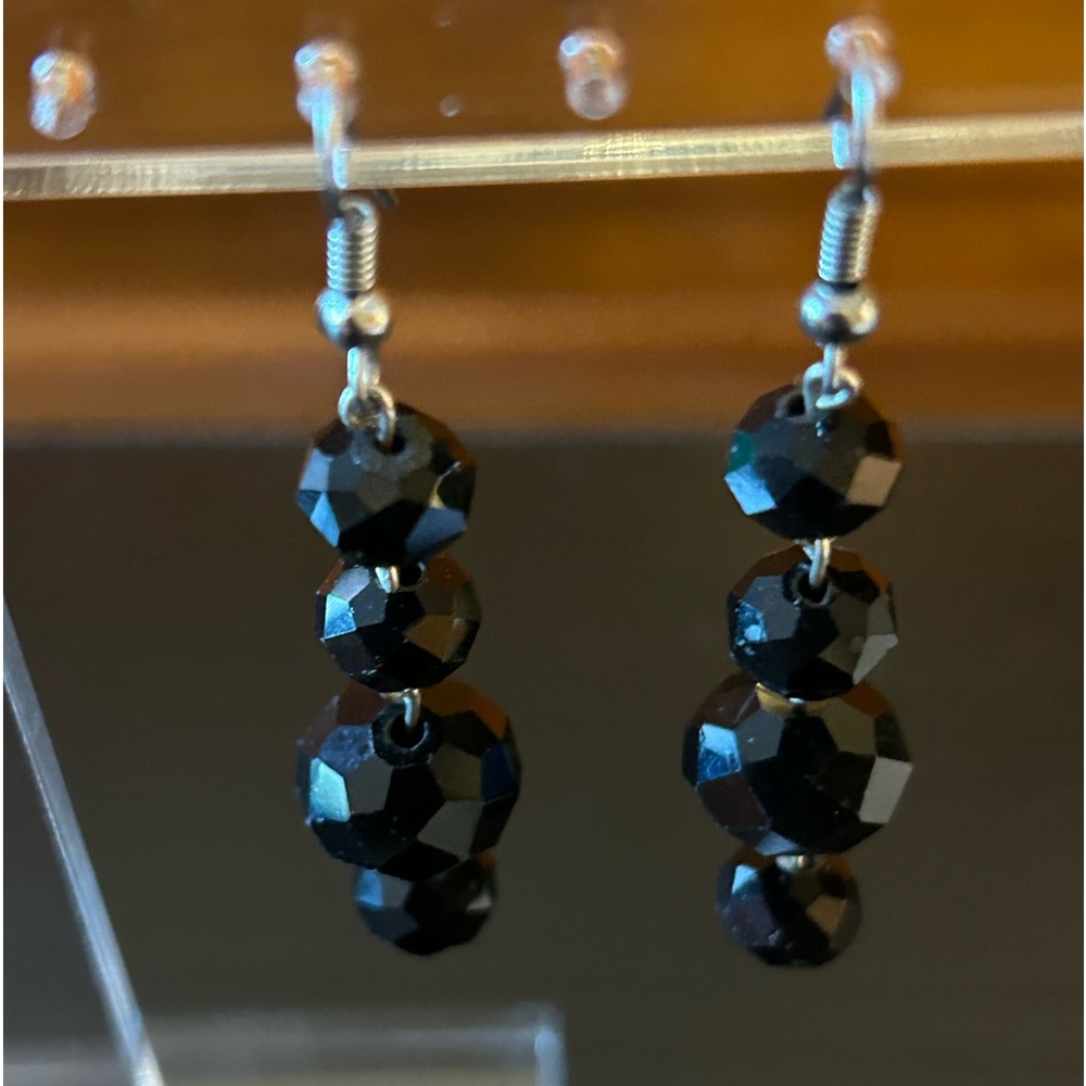 Set of 4 crystal beads dangle from silver hooks